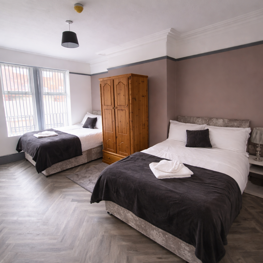 Spacious bedroom with twin beds